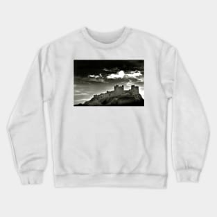 Dark clouds over Bamburgh Castle - Northumberland, UK Crewneck Sweatshirt